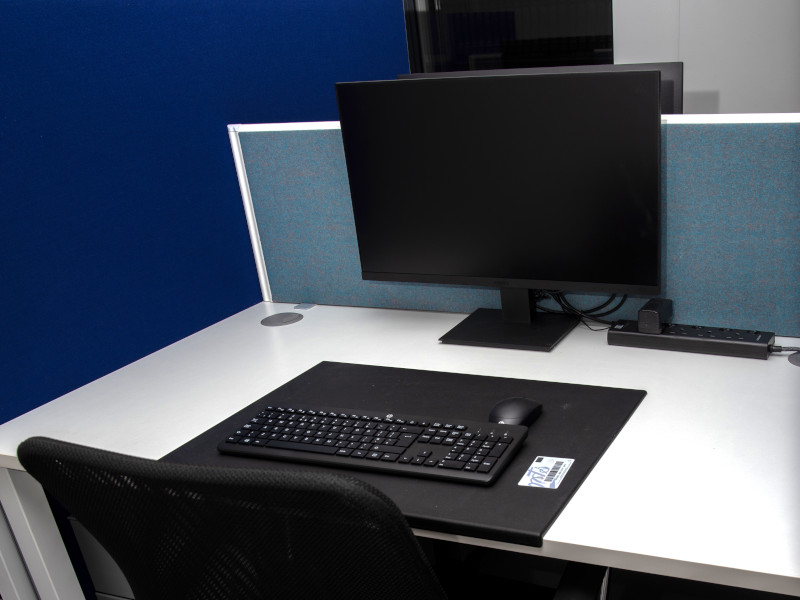 close up of a computer desk workstation